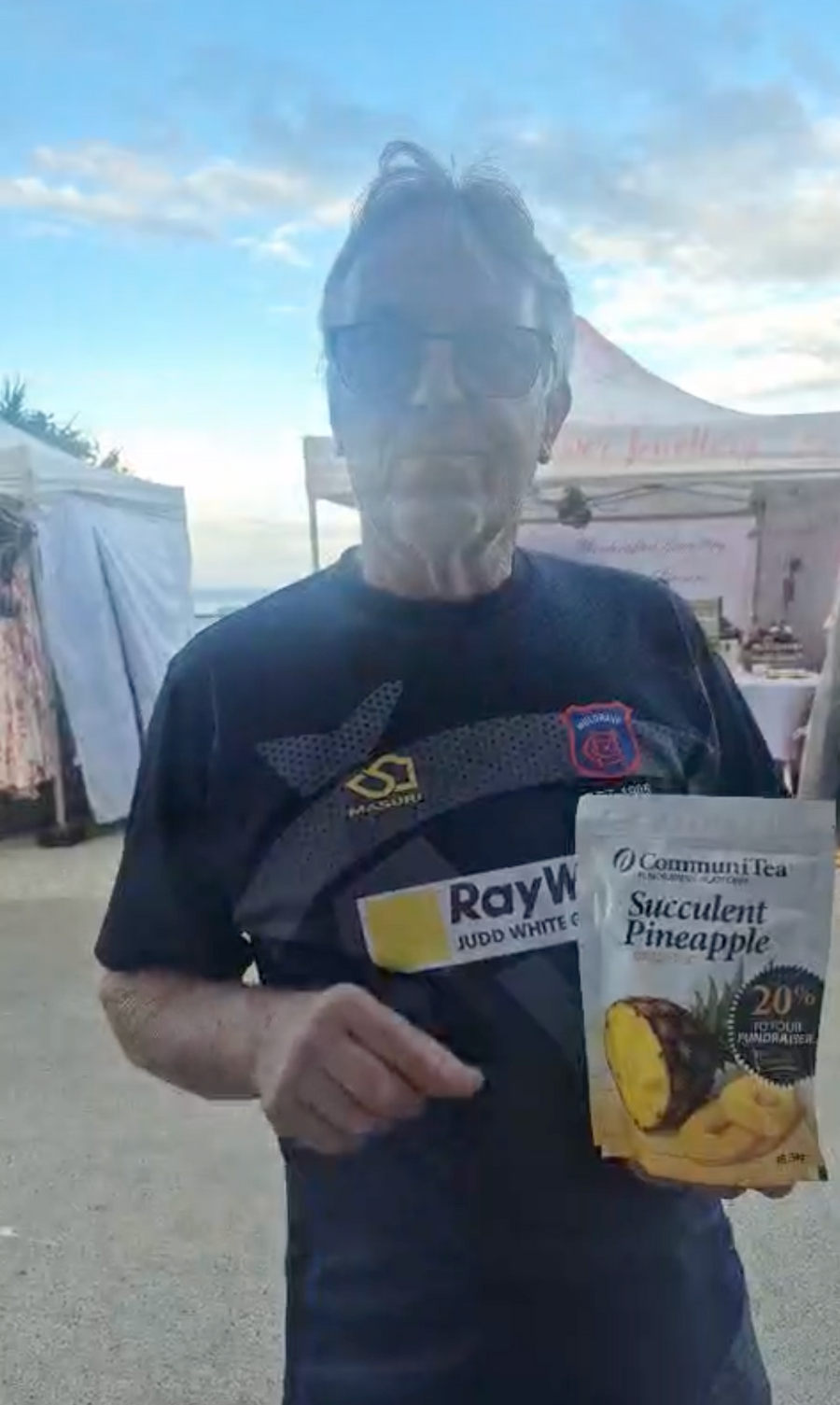 Customer trying Dried Pineapple